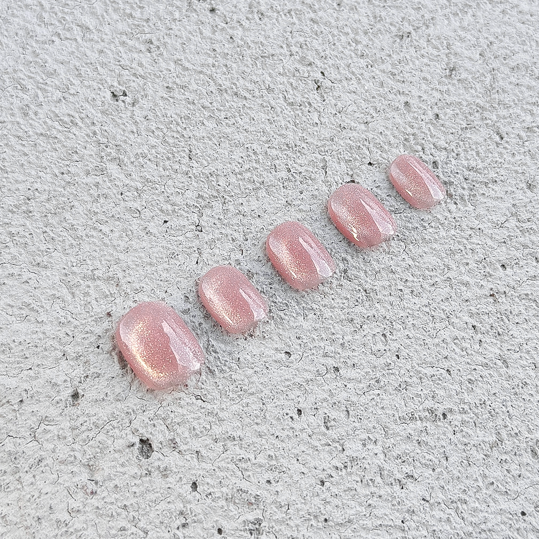 Handmade short glossy cat eye press-on nails in semi-transparent jelly pink, with a delicate cat-eye shimmer, Fincloset Casual Elegance collection