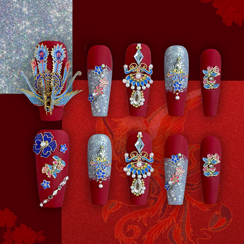 A stunning set of coffin-shaped, handmade press-on nails inspired by Chinese culture, featuring red and peacock blue bases adorned with intricate phoenix and floral designs.